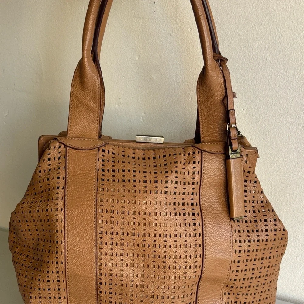 BCBGMaxAzria Perforated Brown Satchel